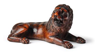 A reclining lion, - Asiatics, Works of Art and furniture