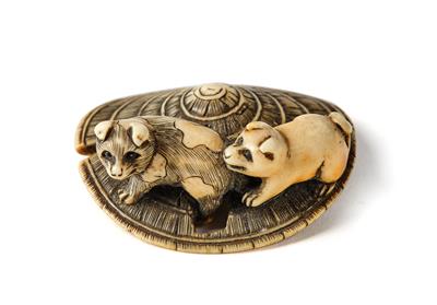 An ivory netsuke of two puppies on straw hat, Japan, 19th century, - Asiatics, Works of Art and furniture