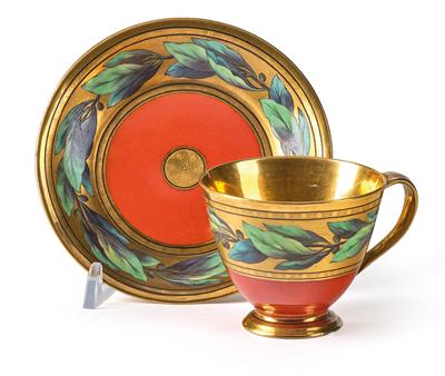 A Cup and Saucer with Laurel Leaf Frieze and Fruit, - Works of Art
