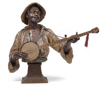 A large bust of a banjo player with straw hat by Goldscheider, - Jugendstil e arte applicata del XX secolo