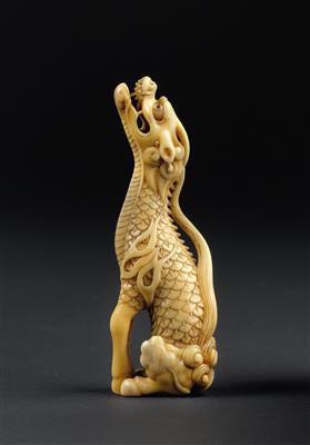 An ivory netsuke of a howling kirin, Japan, 19th cent. - Umění a starožitnosti