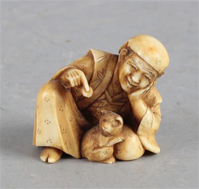 Netsuke eines sitzenden Mannes mit Hund, - Antiques