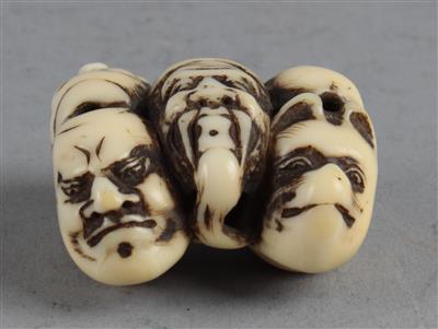 Netsuke einer Maskengruppe von sieben Masken, - Works of Art