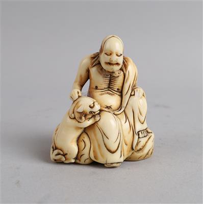 Netsuke Rakan mit Shishi, Japan, 18. Jh., - Starožitnosti