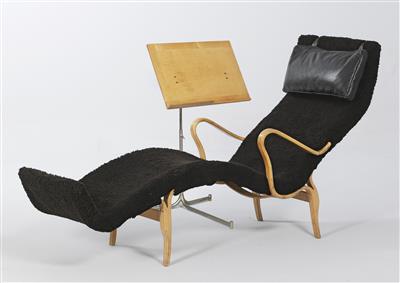 A chaise longue and a book stand, - Design