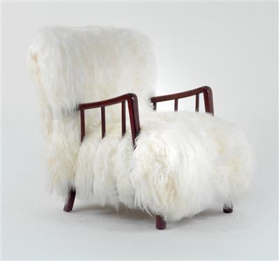 An armchair, the design attributed to Fritz Hansen, - Design