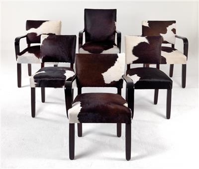 A suite of furniture comprising a dining table, four armchairs and two chairs, designed by Otto Prutscher - Design