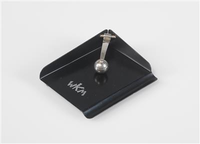 A notepad holder, designed by Marianne Brandt - Design