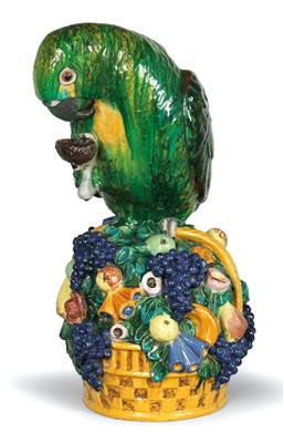 A parrot on a basket of fruit, probably by Wienerberger, - Kolekce Reinhold Hofstätter