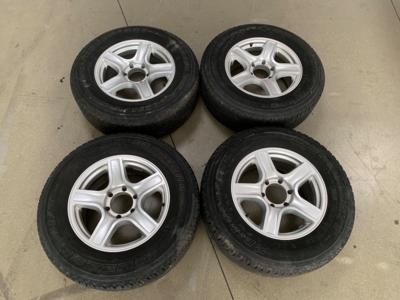 4 Ganzjahreskompletträder "Bridgestone 265/65R17 112H" auf Alufelgen, - Fahrzeuge und Technik